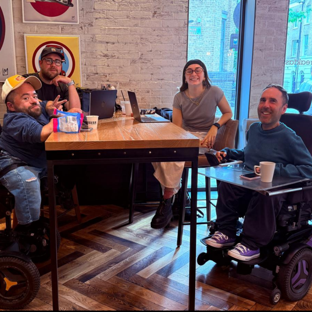 Martyn Sibley and the Purple Goat team in a cafe-style setting